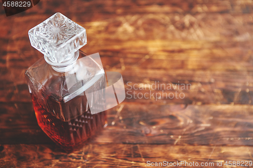 Image of Elegant carafe filled with whiskey, bourbon or rum