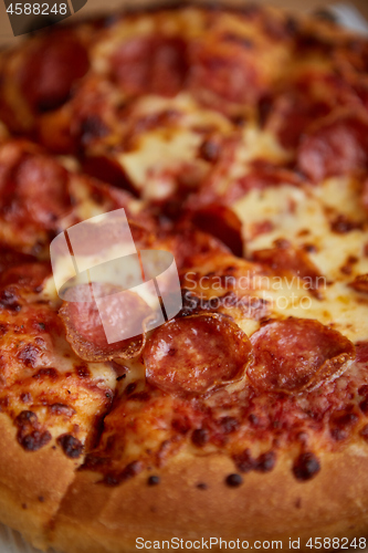 Image of Pepperoni pizza closeup with selective focus