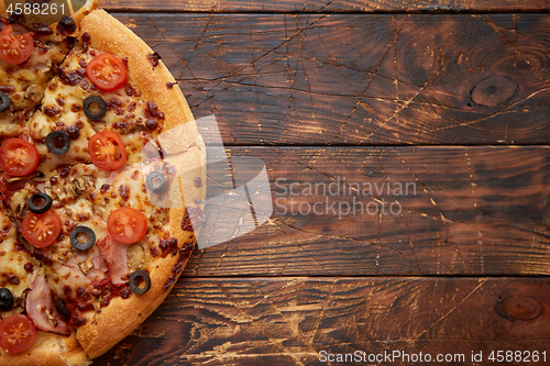 Image of Pizza pepperoni with mozzarella cheese, tomato sauce and salami