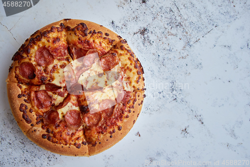 Image of Pizza pepperoni with mozzarella cheese, tomato sauce and salami