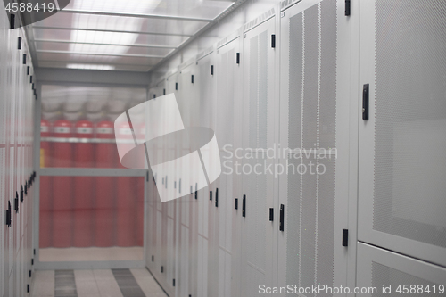 Image of modern server room with white servers