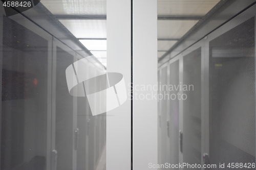 Image of modern server room with white servers