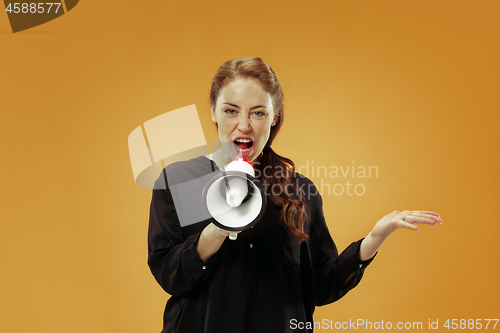 Image of Woman making announcement with megaphone