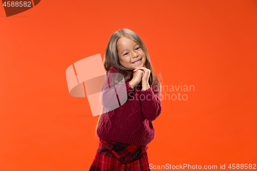 Image of The happy teen girl standing and smiling