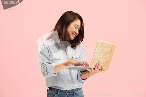 Image of Businesswoman with laptop. Love to computer concept.