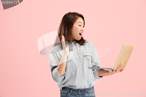 Image of Businesswoman with laptop. Love to computer concept.