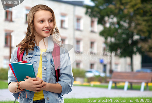 Image of happy smiling teenage student girl with school bag