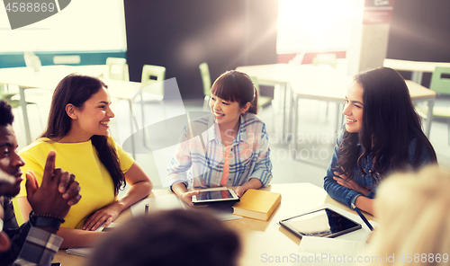 Image of group of high school students with tablet pc