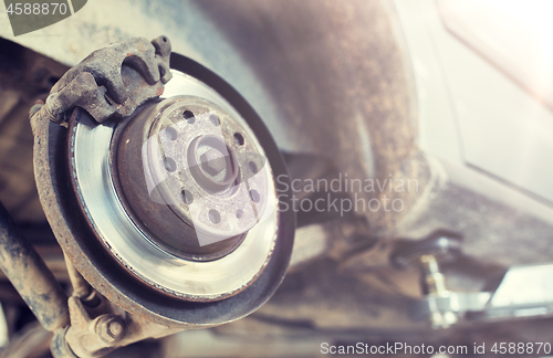 Image of car brake disc at repair station