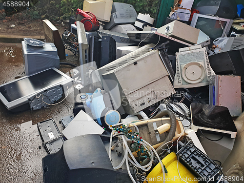 Image of Pile of used electronic and housewares waste