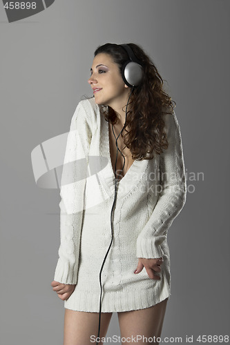 Image of Sexy woman listening music