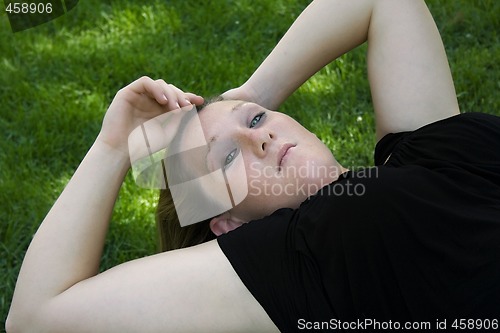 Image of Beautiful Girl in the Park in a Black Dress 