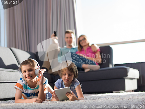 Image of couple spending time with kids