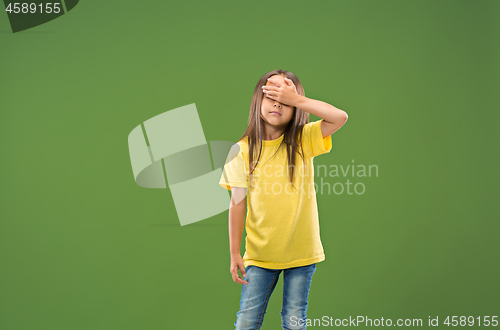 Image of Beautiful teen girl looking sad and bewildered