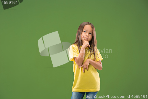 Image of Young serious thoughtful teen girl. Doubt concept.