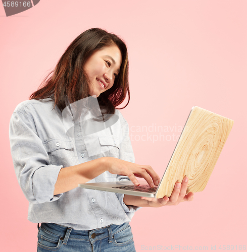 Image of Businesswoman with laptop. Love to computer concept.