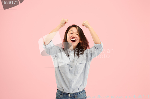 Image of Winning success woman happy ecstatic celebrating being a winner. Dynamic energetic image of female model