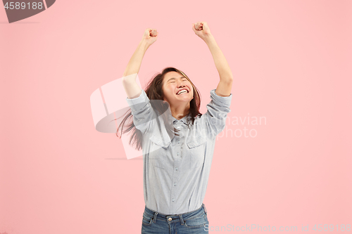 Image of Winning success woman happy ecstatic celebrating being a winner. Dynamic energetic image of female model