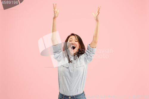 Image of Winning success woman happy ecstatic celebrating being a winner. Dynamic energetic image of female model