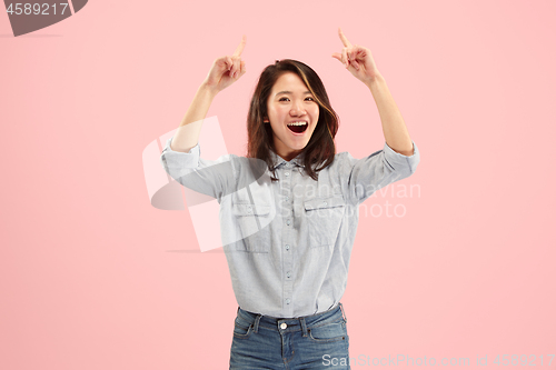 Image of Winning success woman happy ecstatic celebrating being a winner. Dynamic energetic image of female model