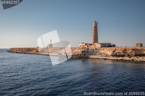 Image of Tall lighthouse on the sea