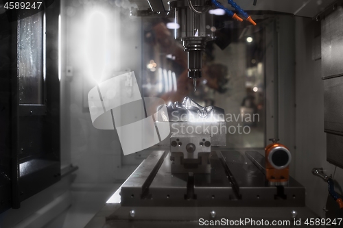 Image of Automated robotic drill working on steel human face