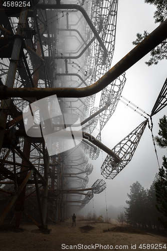 Image of Large antenna complex in the mist