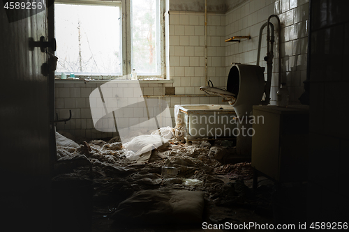 Image of Old laundry room of abandoned hospital