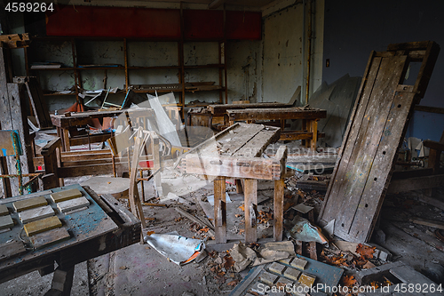 Image of Messy and abandoned classroom in ghost town