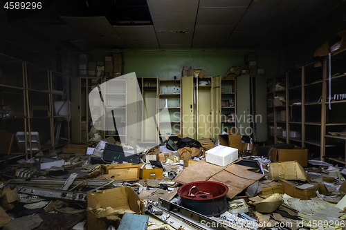 Image of Messy room in abandoned building with lot of junk