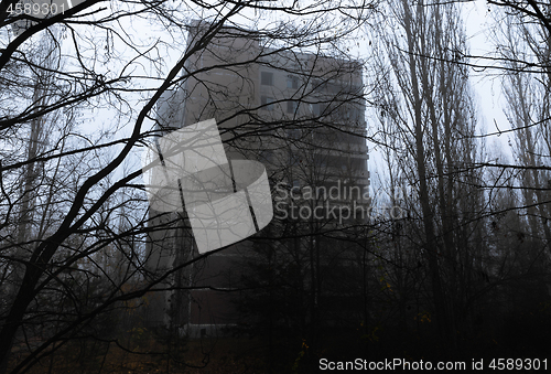 Image of Abandoned building in the woods at ghost city