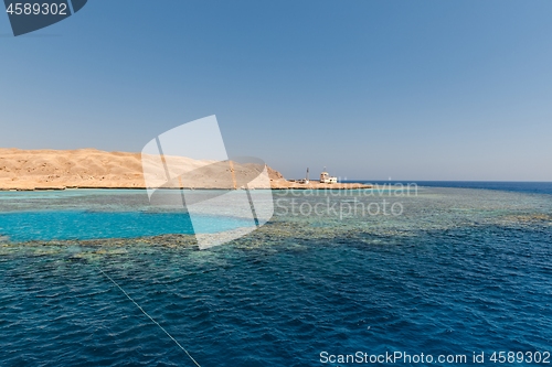 Image of Small island with coral reef