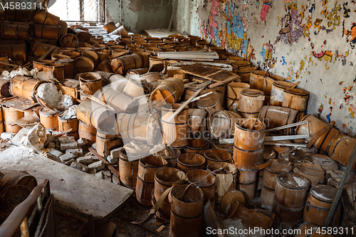 Image of Old and damaged wine and beer barrels