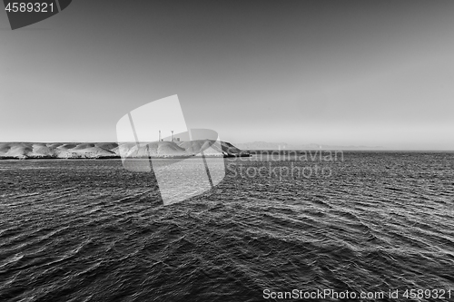 Image of Land over the horizon with mountains