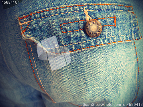 Image of Blue jeans with pockets close-up