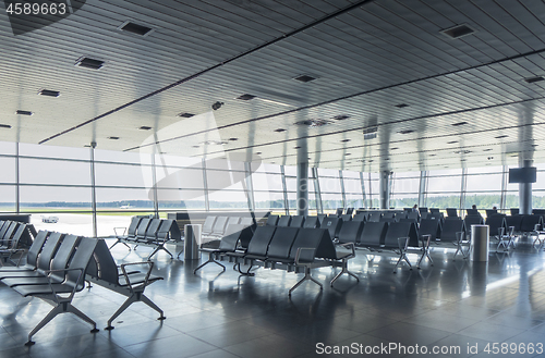 Image of Waiting hall in the airport with empty arm-chairs.