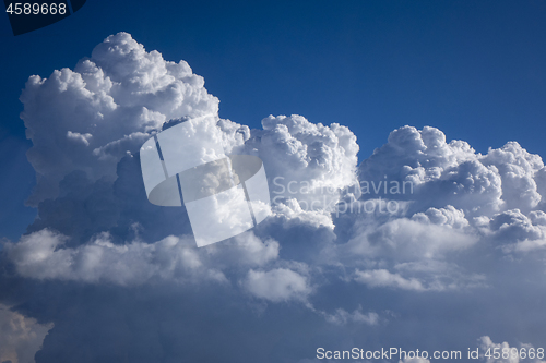 Image of Clouds frame as a creative blue sky background.