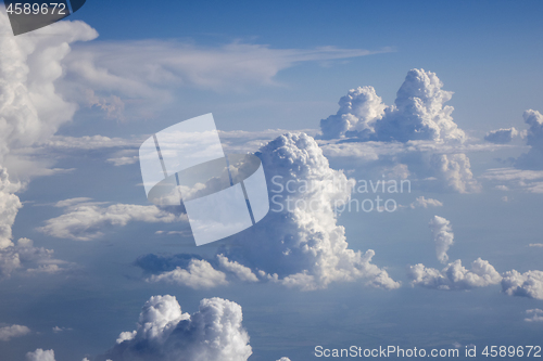 Image of Blue sky landscape with big cumulus clouds.