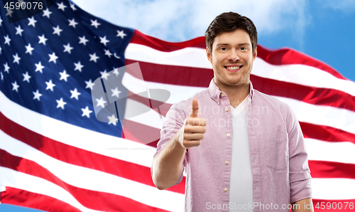 Image of happy man over flag of united states of america