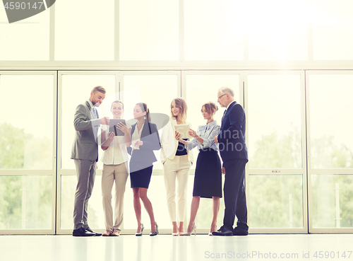 Image of business people with tablet pc computers at office