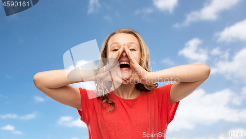 Image of happy teenage girl in red t-shirt shouting