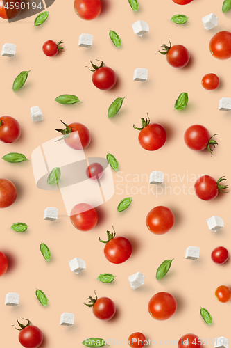 Image of Fresh natural pizza infredients tomatoes, basil and cheese.