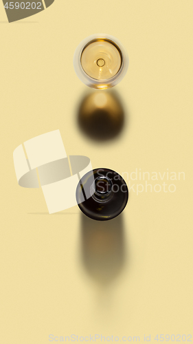 Image of Wine alcohol drink bottle and glass of white wine.