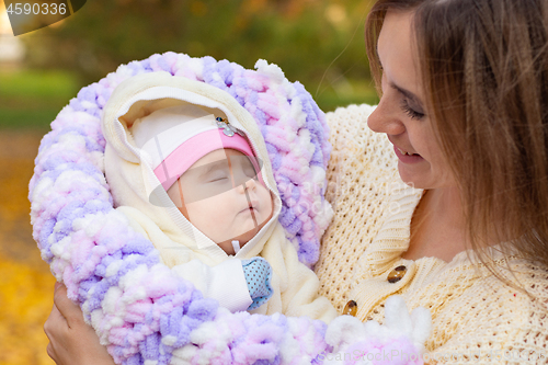 Image of Mom rejoices in her two-month-old baby