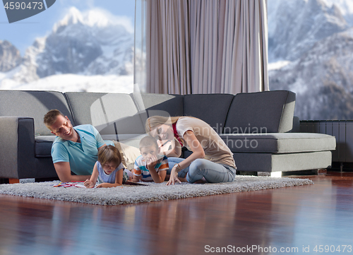 Image of happy couple spending time with kids