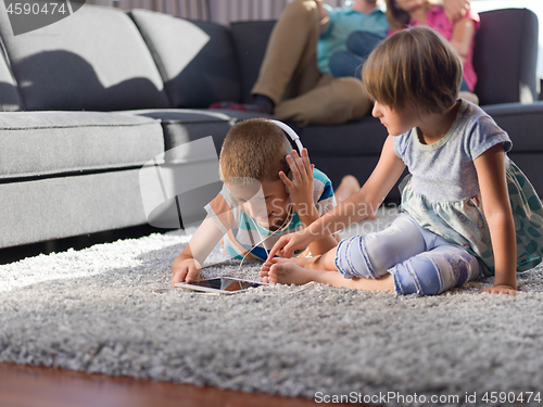 Image of couple spending time with kids