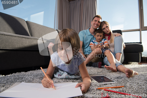 Image of young couple spending time with kids