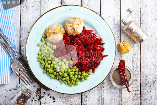 Image of cutlets with peas