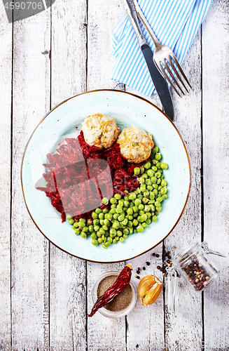 Image of cutlets with peas