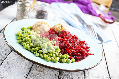 Image of cutlets with peas